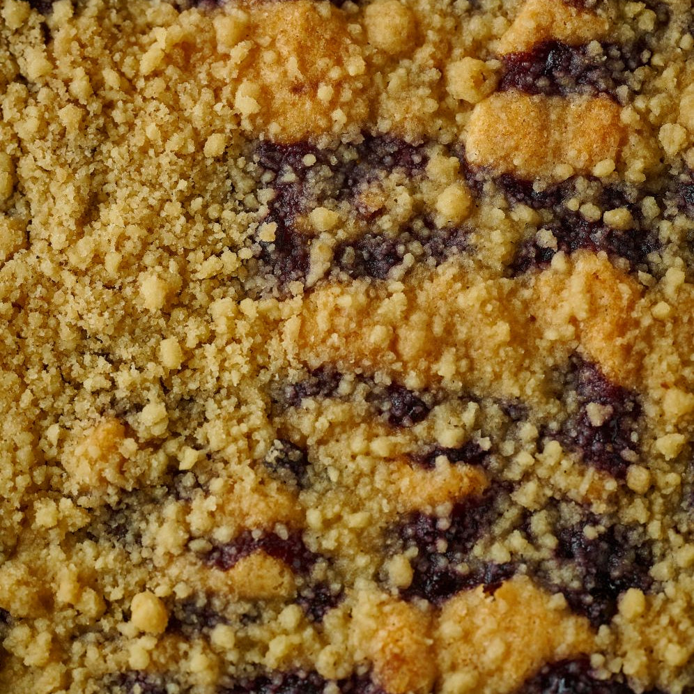 lemon and blueberry tart close up with cumble topping