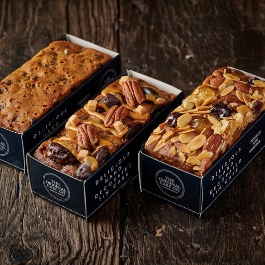 trio of fruit cakes including genoa fruit cake, butter fruit and nut cake and caramel and date fruit cake