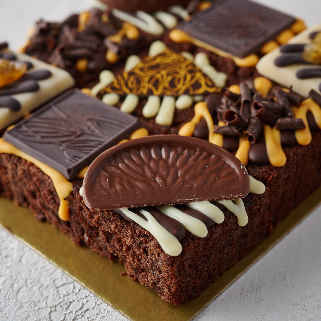 selection of chocolate orange truffle cakes 