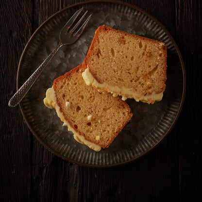 two slices of st clements loaf cake on plate 